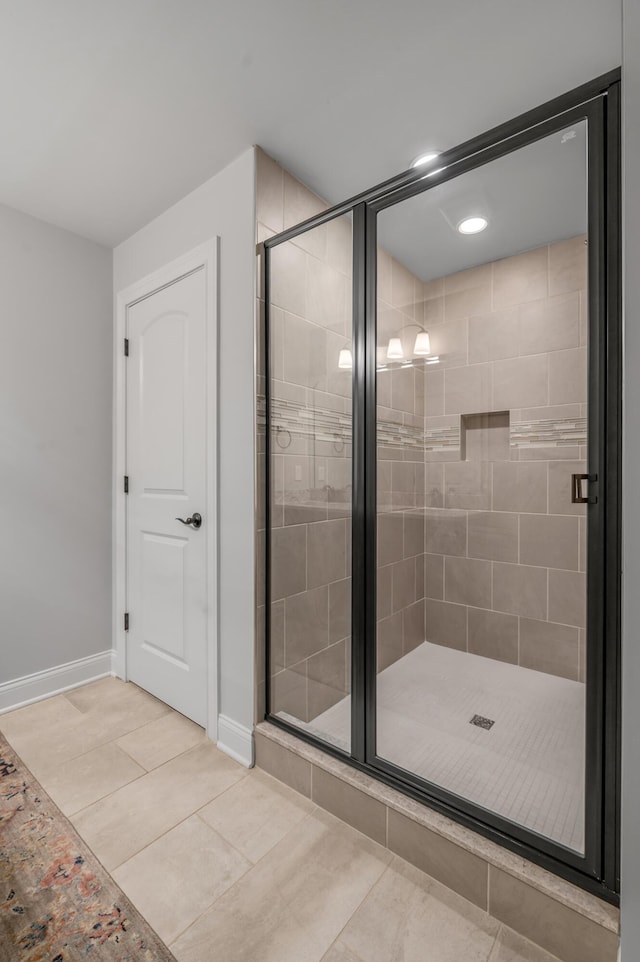2131 Patchen Lake Ln, Lexington, KY 40505 - bathroom with a stall shower, baseboards, tile patterned floors, and recessed lighting