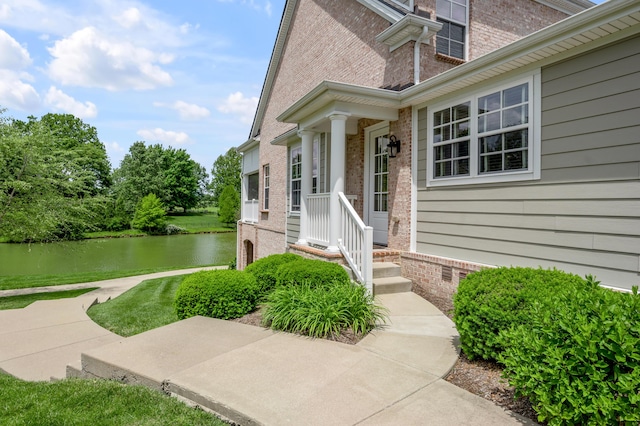 2131 Patchen Lake Ln, Lexington, KY 40505 - entrance to property with brick siding and a water view