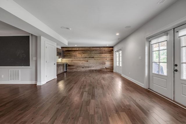 2131 Patchen Lake Ln, Lexington, KY 40505 - unfurnished living room featuring wood walls, dark wood-type flooring, baseboards, and recessed lighting