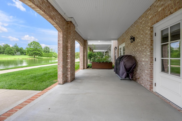 2131 Patchen Lake Ln, Lexington, KY 40505 - view of patio / terrace with a water view and a grill