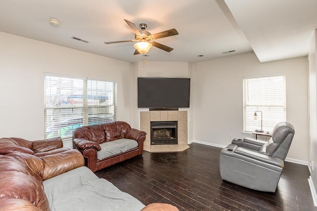 186 Santa Barbara Blvd, Georgetown, KY 40324 - living area with ceiling fan, dark wood-style flooring, baseboards, and a fireplace
