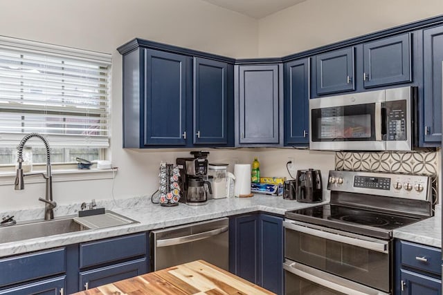 186 Santa Barbara Blvd, Georgetown, KY 40324 - kitchen featuring stainless steel appliances, blue cabinetry, and a sink