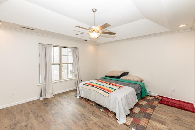 186 Santa Barbara Blvd, Georgetown, KY 40324 - bedroom featuring wood finished floors, recessed lighting, baseboards, ornamental molding, and a raised ceiling