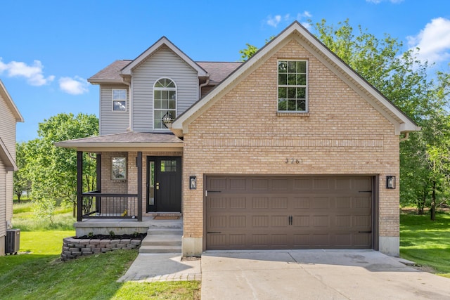 3261 Royal Troon Rd, Lexington, KY 40509 - traditional-style house with brick siding, a front yard, driveway, and roof with shingles