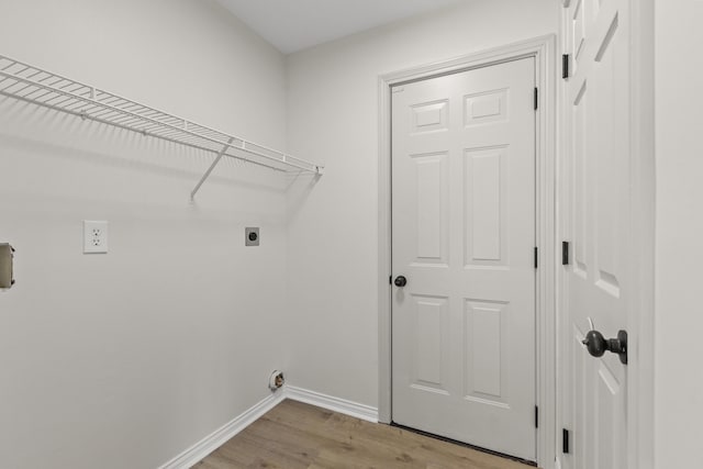 3261 Royal Troon Rd, Lexington, KY 40509 - washroom with hookup for an electric dryer, baseboards, and light wood-type flooring