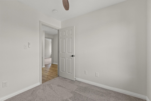 3261 Royal Troon Rd, Lexington, KY 40509 - unfurnished room featuring light carpet, ceiling fan, baseboards, and a smoke detector