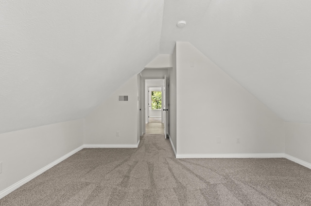 3261 Royal Troon Rd, Lexington, KY 40509 - bonus room with lofted ceiling, carpet floors, and baseboards