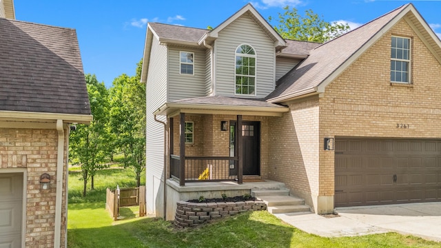 3261 Royal Troon Rd, Lexington, KY 40509 - view of front facade featuring brick siding, roof with shingles, a porch, and a front lawn
