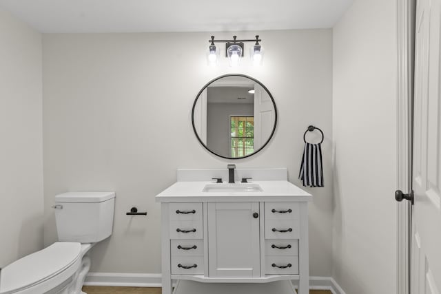 3261 Royal Troon Rd, Lexington, KY 40509 - bathroom with vanity, baseboards, and toilet