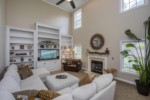 3789 Ridge View Way, Lexington, KY 40509 - carpeted living area featuring a high ceiling, a premium fireplace, crown molding, baseboards, and ceiling fan