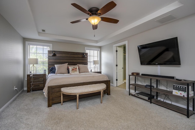 3789 Ridge View Way, Lexington, KY 40509 - bedroom featuring light colored carpet, baseboards, a raised ceiling, and multiple windows