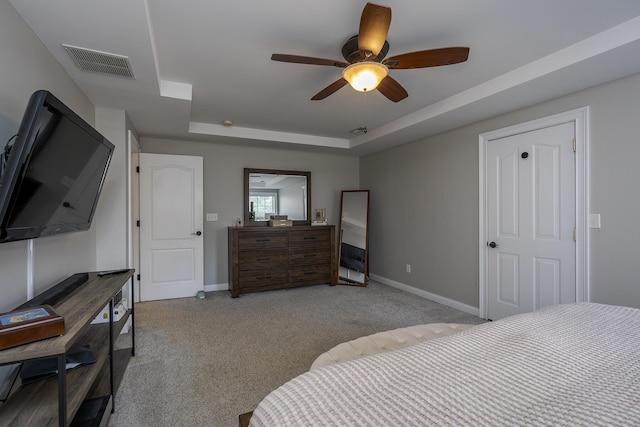 3789 Ridge View Way, Lexington, KY 40509 - carpeted bedroom with a tray ceiling, baseboards, and a ceiling fan
