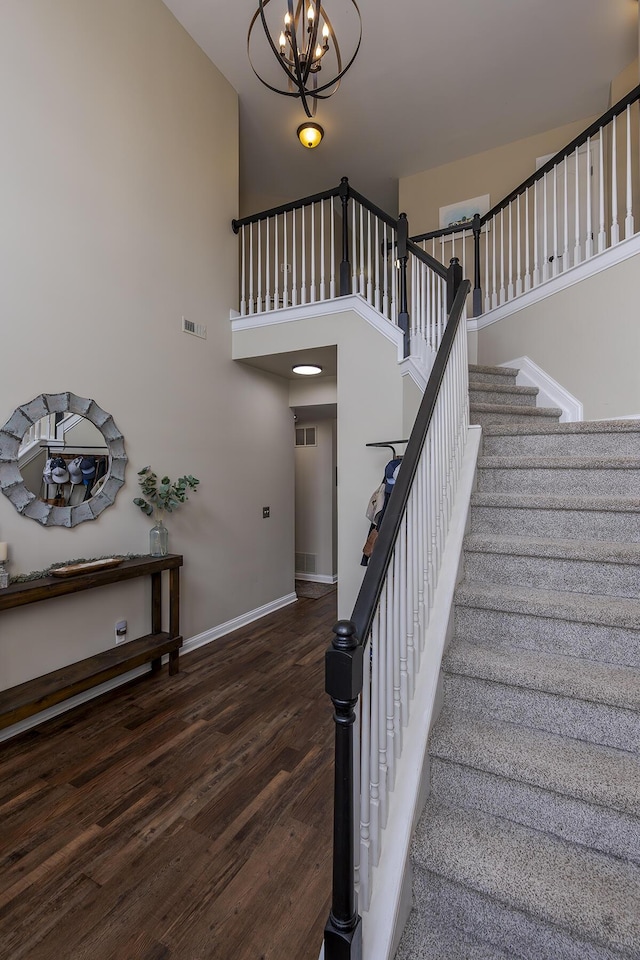 3789 Ridge View Way, Lexington, KY 40509 - stairway with wood finished floors, baseboards, a chandelier, and a high ceiling