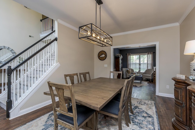 3789 Ridge View Way, Lexington, KY 40509 - dining area with wood finished floors, crown molding, baseboards, stairway, and a chandelier