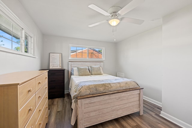680 Beaumont Ave, Harrodsburg, KY 40330 - bedroom with multiple windows, baseboards, dark wood-type flooring, and a ceiling fan