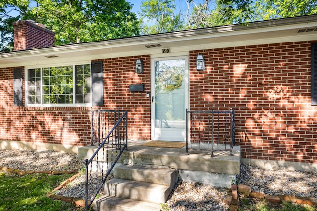 680 Beaumont Ave, Harrodsburg, KY 40330 - entrance to property with a chimney and brick siding