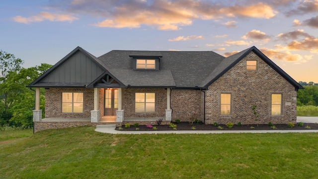4252 Equestrian Way, Richmond, KY 40475 - view of front of property with brick siding, a front lawn, board and batten siding, and roof with shingles