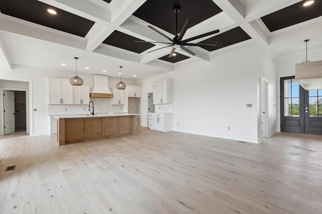 4252 Equestrian Way, Richmond, KY 40475 - kitchen with coffered ceiling, custom exhaust hood, open floor plan, a ceiling fan, and crown molding