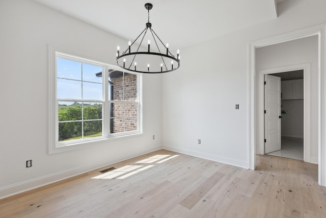 4252 Equestrian Way, Richmond, KY 40475 - unfurnished dining area with a chandelier, light wood-type flooring, and healthy amount of natural light