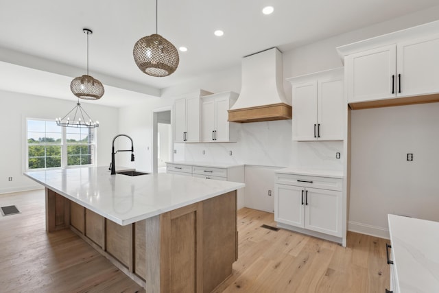 4252 Equestrian Way, Richmond, KY 40475 - kitchen with premium range hood, recessed lighting, light wood-style flooring, white cabinets, and backsplash