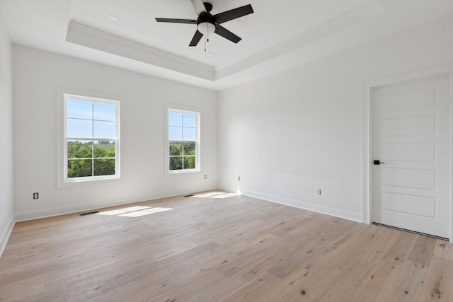 4252 Equestrian Way, Richmond, KY 40475 - empty room with a raised ceiling, crown molding, light wood-type flooring, and a ceiling fan