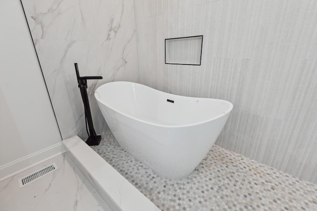 4252 Equestrian Way, Richmond, KY 40475 - bathroom with a soaking tub and marble finish floors