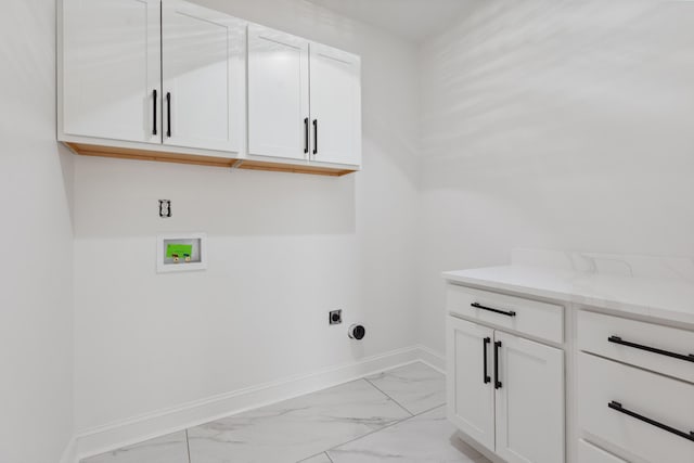 4252 Equestrian Way, Richmond, KY 40475 - laundry area featuring light marble finish flooring, washer hookup, and cabinet space