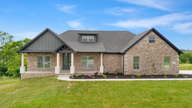 4252 Equestrian Way, Richmond, KY 40475 - craftsman-style house with brick siding, a front yard, board and batten siding, and roof with shingles