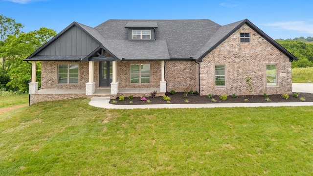 4252 Equestrian Way, Richmond, KY 40475 - craftsman-style house with brick siding, board and batten siding, a front lawn, and roof with shingles