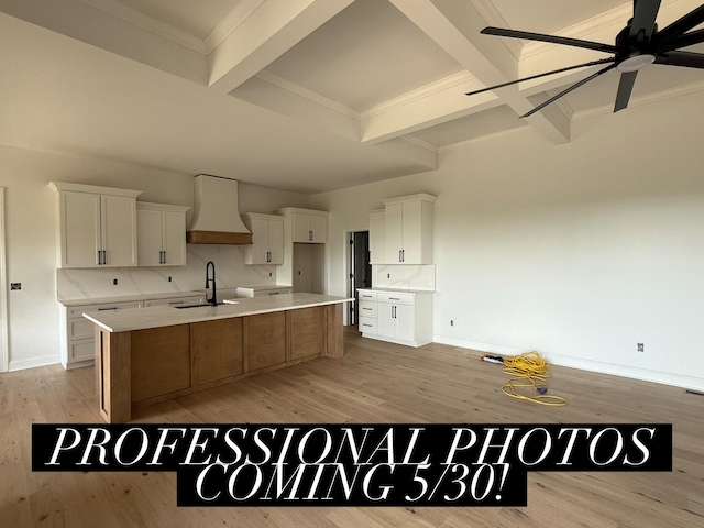 4252 Equestrian Way, Richmond, KY 40475 - kitchen featuring premium range hood, a sink, beam ceiling, ceiling fan, and a spacious island