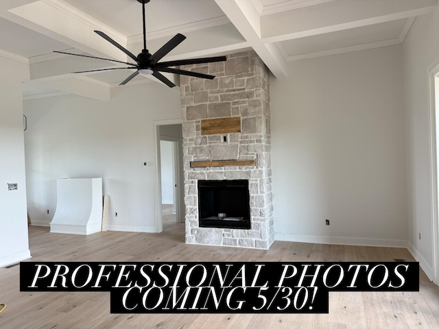 4252 Equestrian Way, Richmond, KY 40475 - unfurnished living room with coffered ceiling, beamed ceiling, ceiling fan, wood finished floors, and a stone fireplace