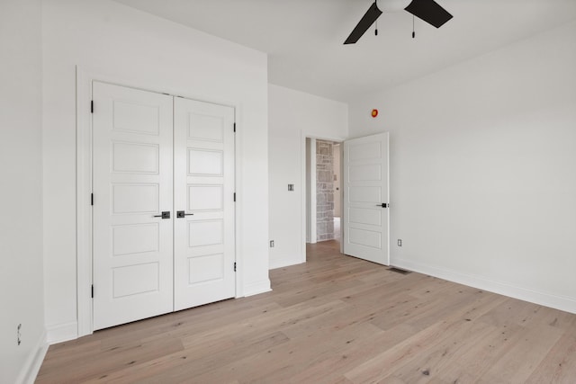 4252 Equestrian Way, Richmond, KY 40475 - unfurnished bedroom with light wood-style floors, a closet, and ceiling fan