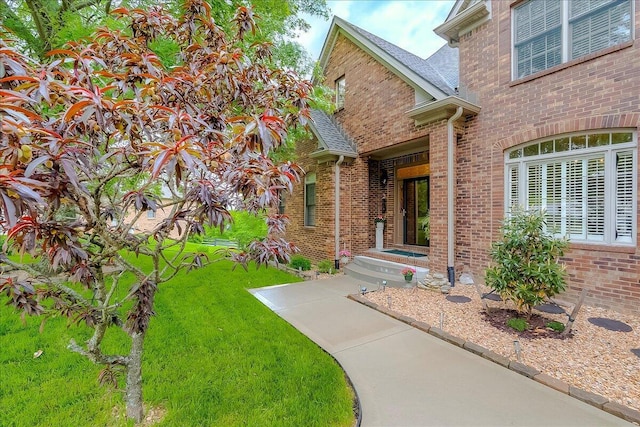 428 Shady Brook Dr, Richmond, KY 40475 - property entrance featuring brick siding, a yard, and a shingled roof