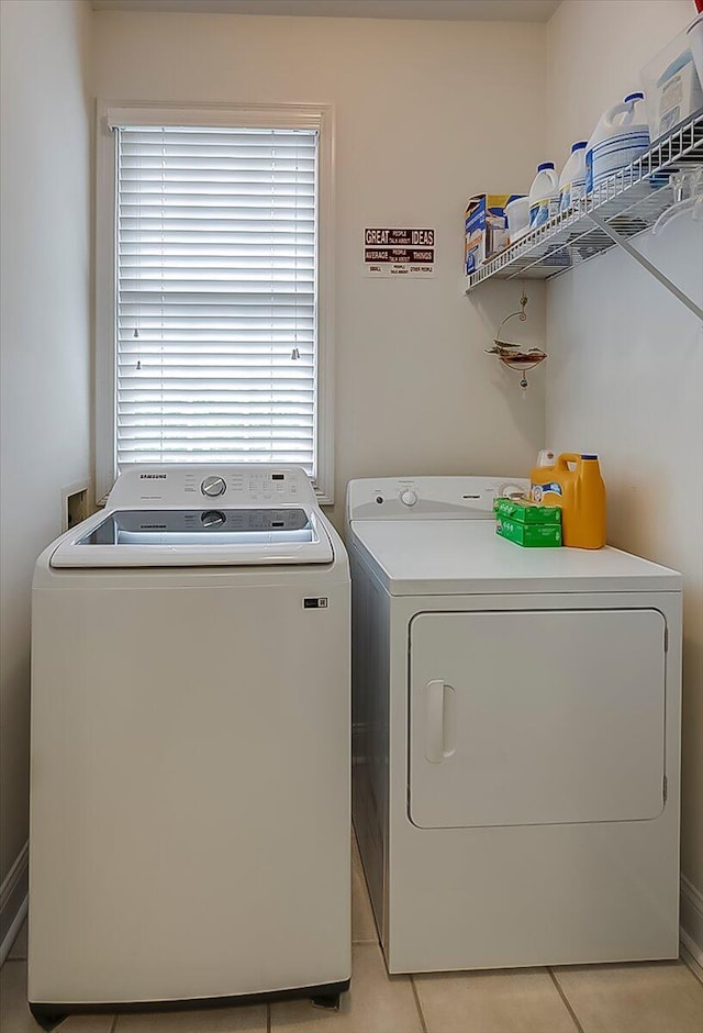428 Shady Brook Dr, Richmond, KY 40475 - laundry area featuring washing machine and clothes dryer and light tile patterned floors