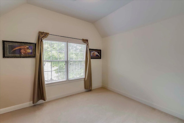 428 Shady Brook Dr, Richmond, KY 40475 - unfurnished room featuring vaulted ceiling, healthy amount of natural light, light colored carpet, and baseboards