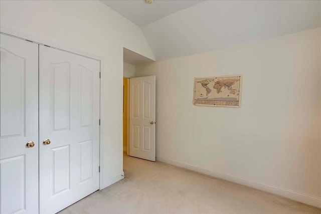 428 Shady Brook Dr, Richmond, KY 40475 - unfurnished bedroom with light carpet, lofted ceiling, baseboards, and a closet