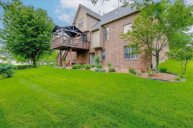 428 Shady Brook Dr, Richmond, KY 40475 - back of house featuring a wooden deck, brick siding, a lawn, and stairs