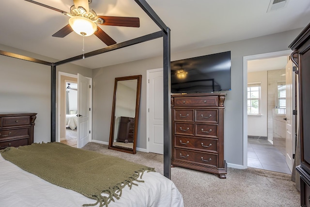 3657 Gladman Way, Lexington, KY 40503 - bedroom with light carpet, baseboards, ensuite bathroom, and a ceiling fan