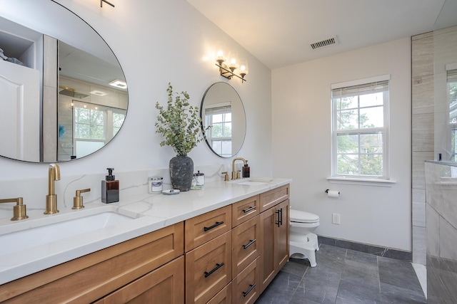 3657 Gladman Way, Lexington, KY 40503 - bathroom with double vanity, toilet, baseboards, and a shower