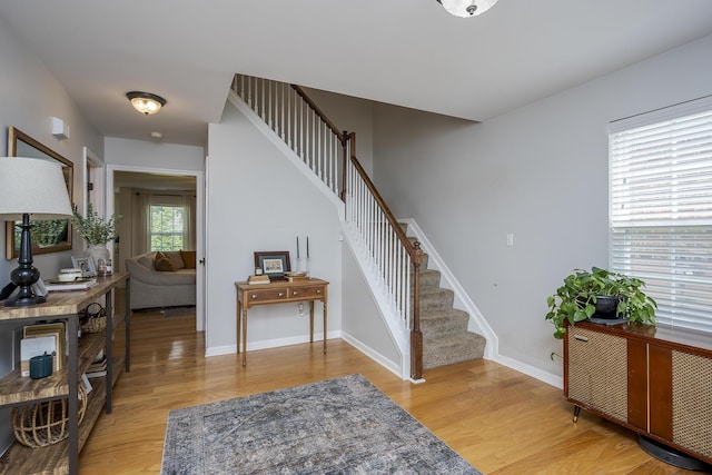 3657 Gladman Way, Lexington, KY 40503 - foyer entrance featuring stairway, light wood-type flooring, and baseboards