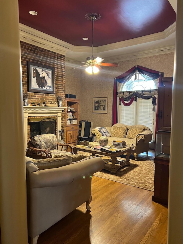 1740 Gose Pike, Danville, KY 40422 - living area with ornamental molding, wood finished floors, a ceiling fan, and a brick fireplace