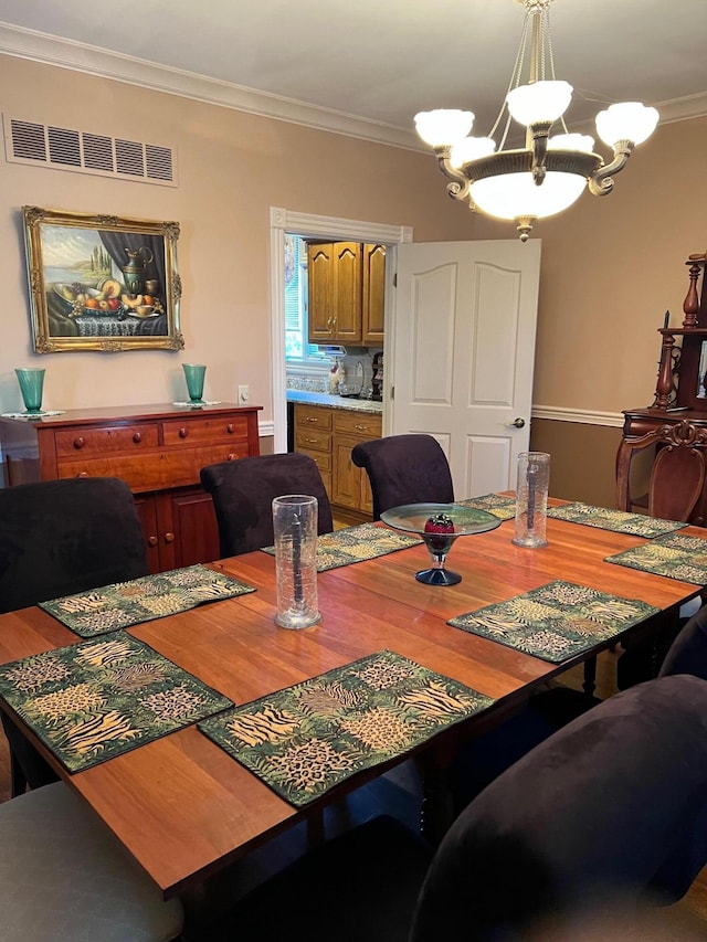 1740 Gose Pike, Danville, KY 40422 - dining area featuring a chandelier and crown molding