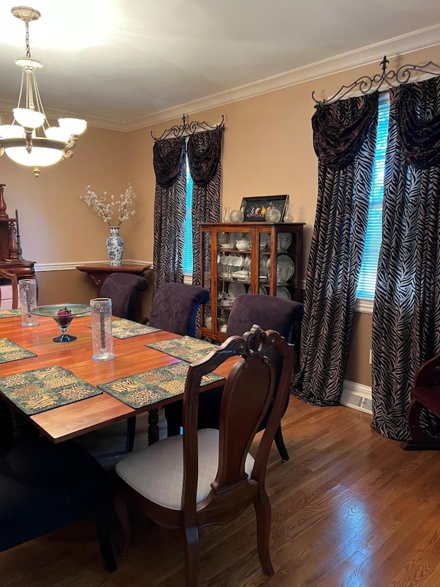 1740 Gose Pike, Danville, KY 40422 - dining room with a chandelier, wood finished floors, and crown molding
