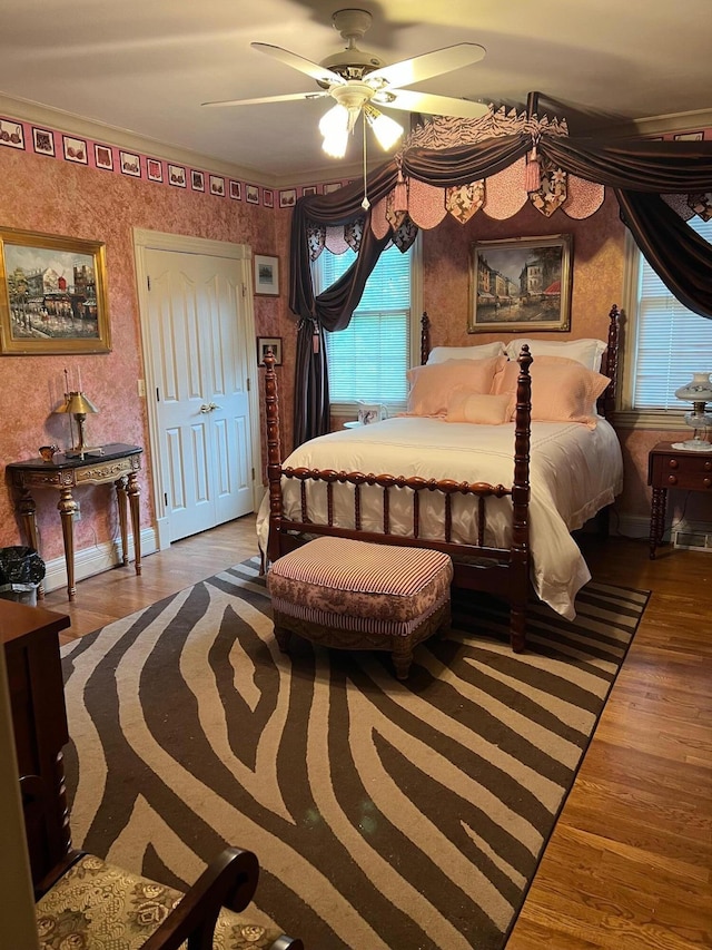 1740 Gose Pike, Danville, KY 40422 - bedroom featuring wood finished floors, wallpapered walls, ceiling fan, and baseboards
