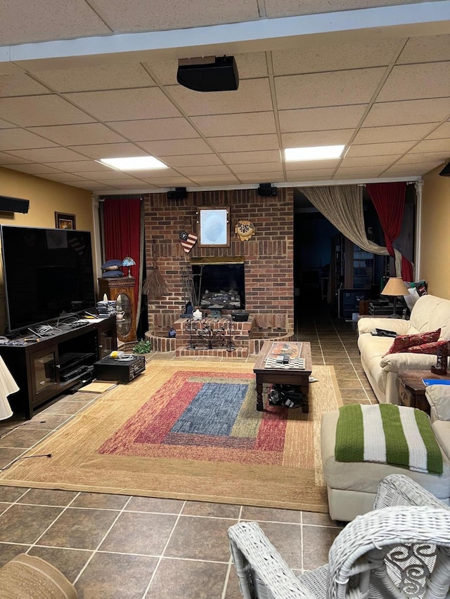 1740 Gose Pike, Danville, KY 40422 - living area featuring a paneled ceiling, a fireplace, and tile patterned flooring