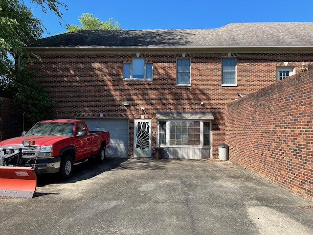 1740 Gose Pike, Danville, KY 40422 - view of front of property featuring brick siding, asphalt driveway, and a garage