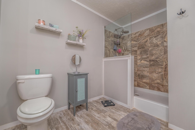 233 Bearskin Holw, Morehead, KY 40351 - bathroom featuring walk in shower, wood finished floors, toilet, ornamental molding, and a textured ceiling