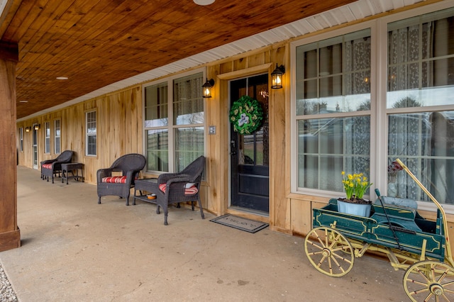 1235 Jackstown Rd, Paris, KY 40361 - view of exterior entry with a porch and board and batten siding
