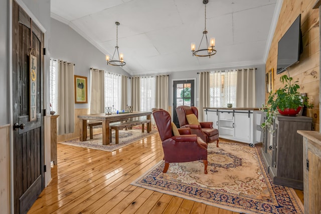 1235 Jackstown Rd, Paris, KY 40361 - living area featuring a chandelier, lofted ceiling, light wood finished floors, and ornamental molding
