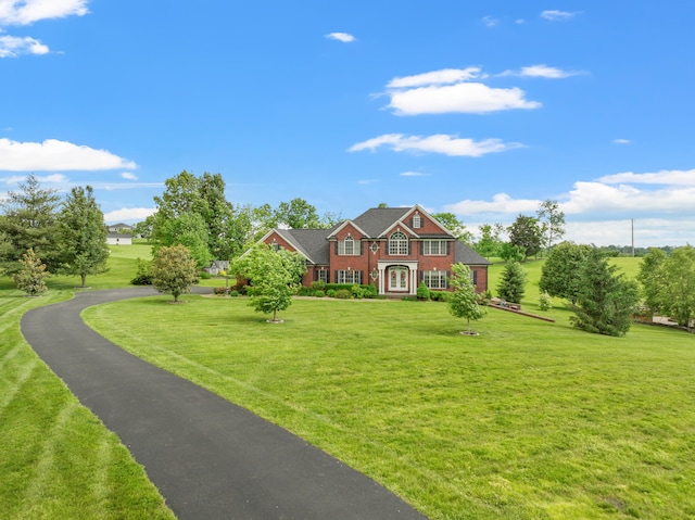 1658 S S Byp, Lawrenceburg, KY 40342 - view of front of house featuring a front yard, brick siding, and driveway